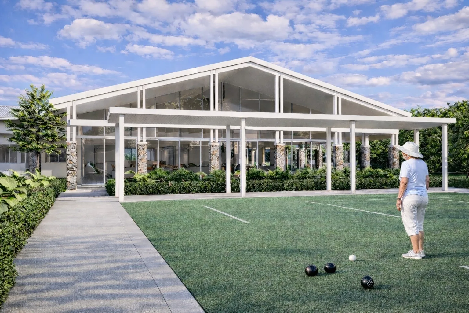 Residents playing lawn bowls beside the clubhouse